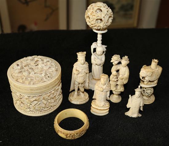 19th / early 20th century Canton ivories - a box and cover, 4 chess pieces, a puzzle ball and a stand and a napkin ring